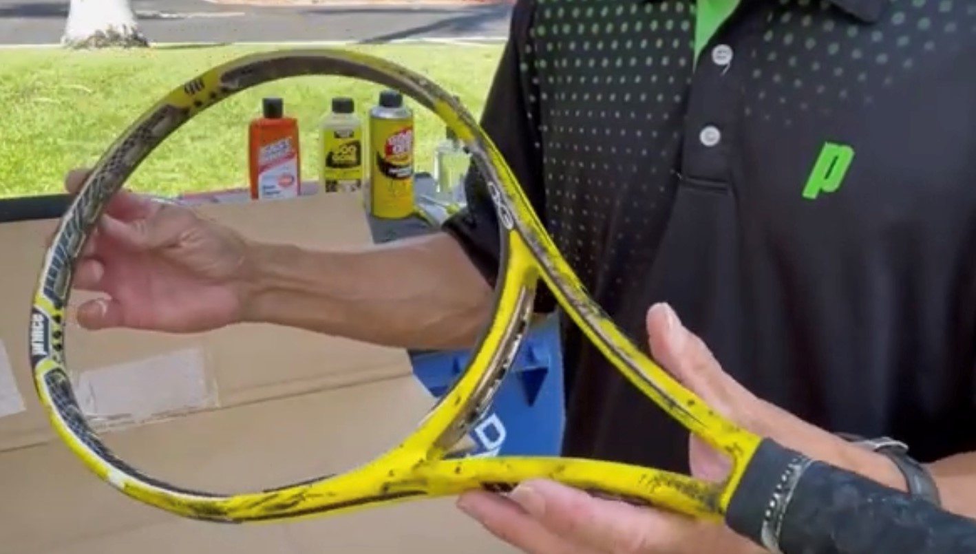 Cleaning dirty tennis racquet